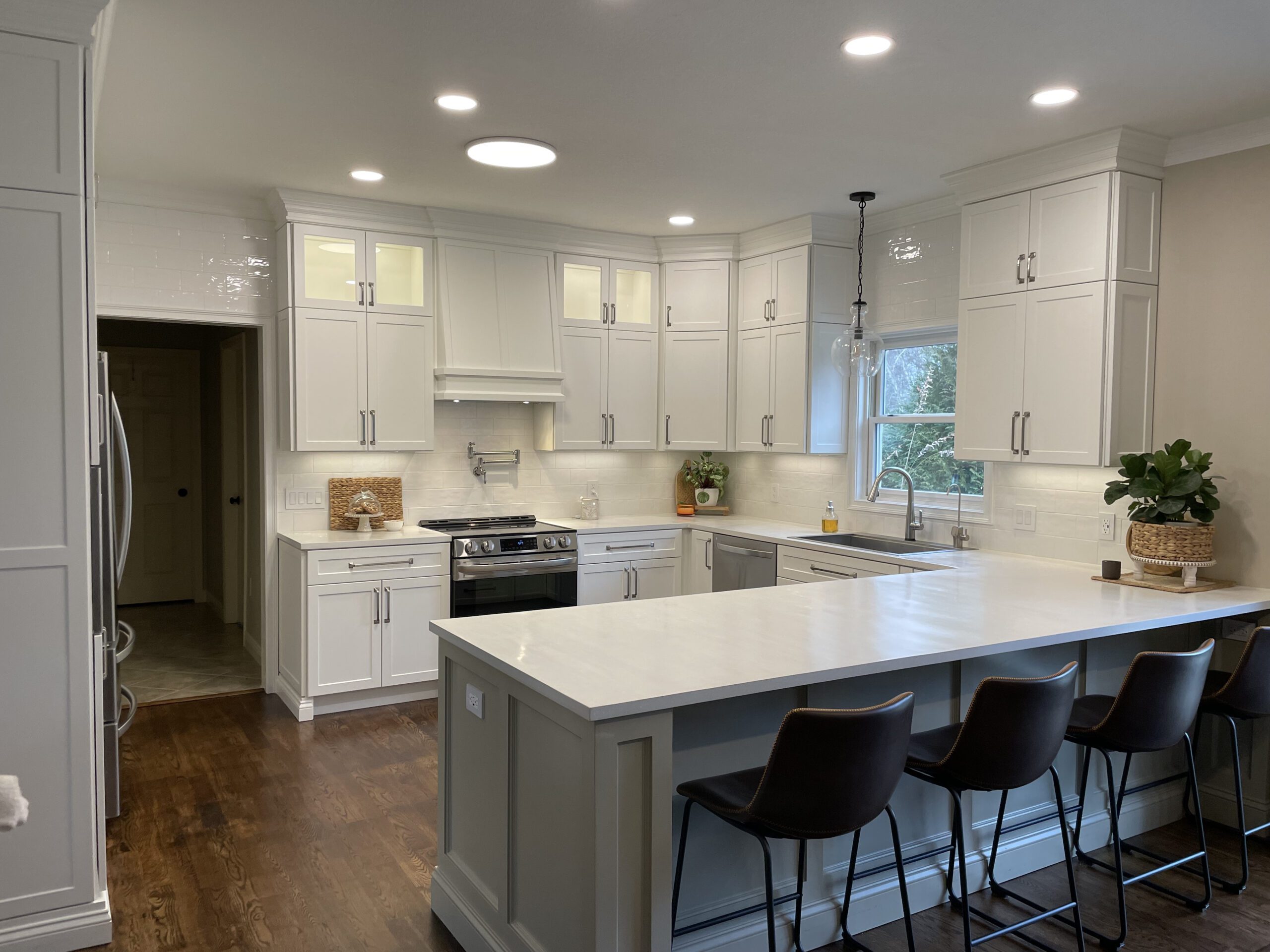 Clean, modern kitchen refresh with white cabinets.